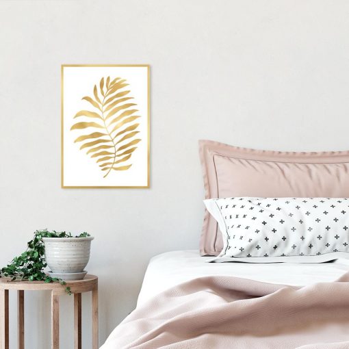 Plakat z motywem złotego liścia palmy